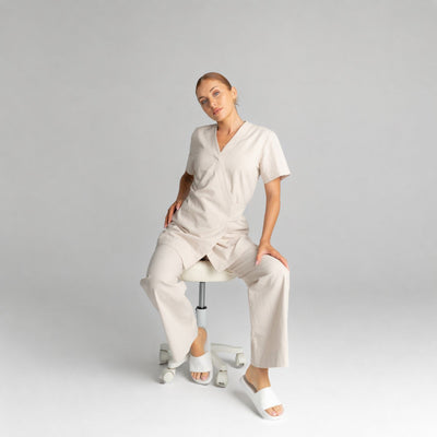 Eden Linen Tunic in Oatmeal, seated | Spring Spa Wear