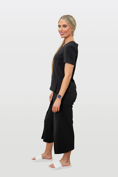 Spa Uniform 09 clearance tunic on model, front view | Spring Spa Wear